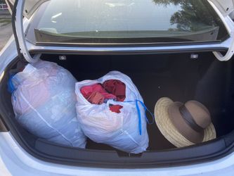 Name brand Ladies clothes, mostly brand new, some with tags, shorts size 10-12, large shirts, Blouses, rompers and dresses