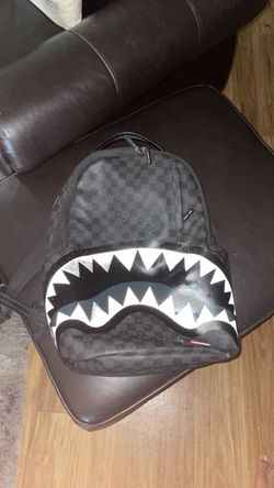 Spray ground backpack