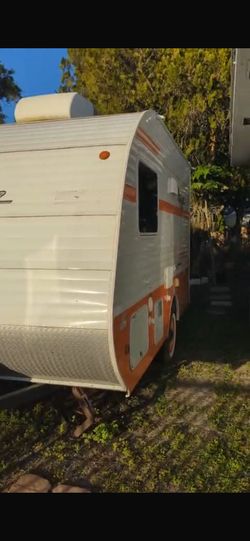 Only 16 Feet little and it can be hauled for any car , year 2021  RV Camper Riverside Retro 135 , 16 feet Large and have everything do you Need Inside