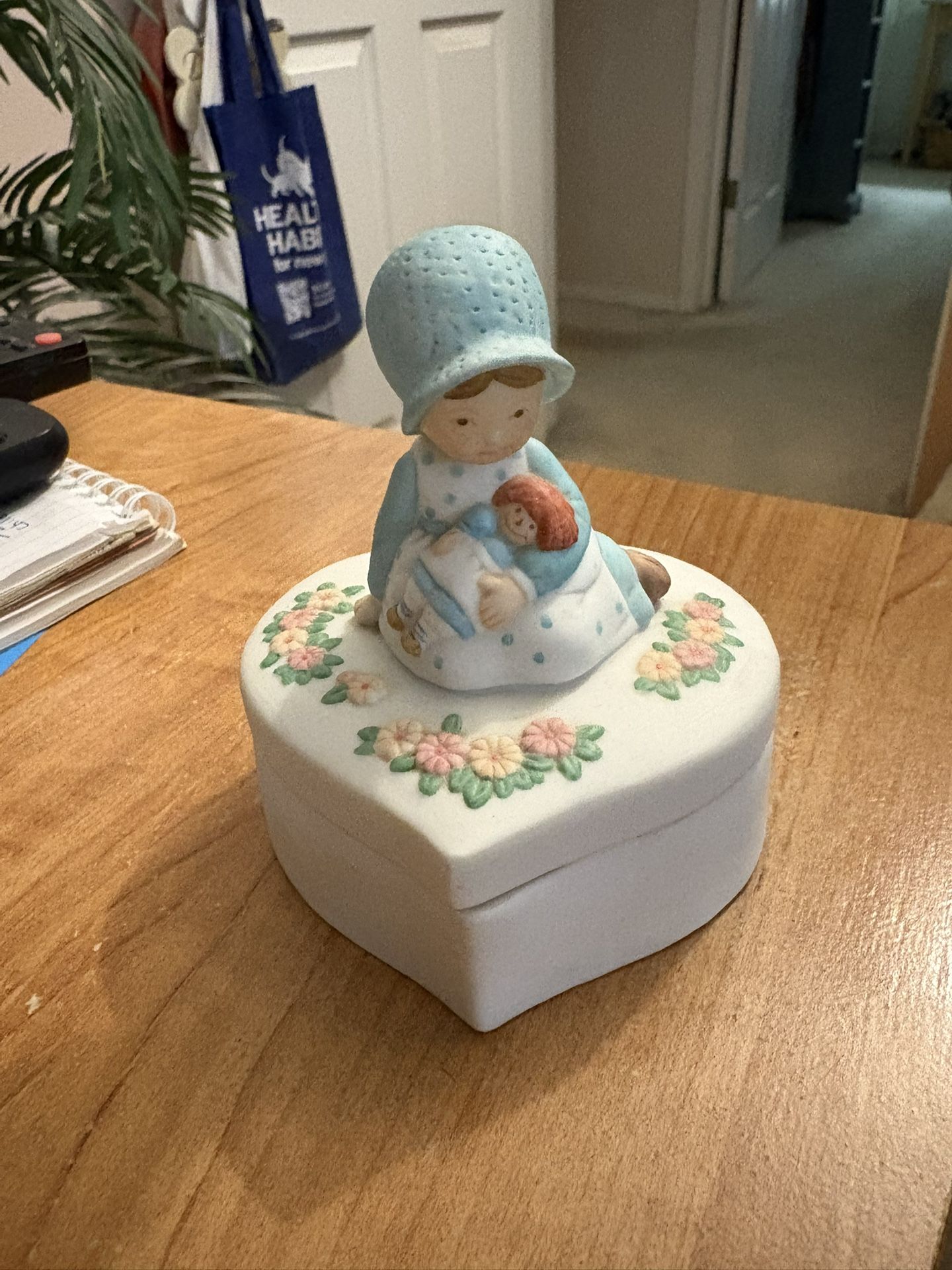 Heart Shape Girl Holding A Baby