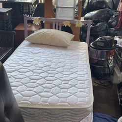 Twin mattress and bedframe. Great condition we saw all the time.