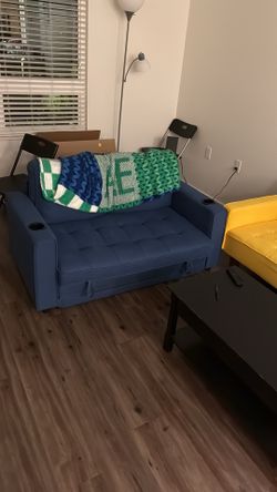 Blue love seat sofa - pull out bed