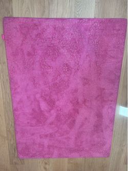 Pink Juicy Couture rug with gold leopard print