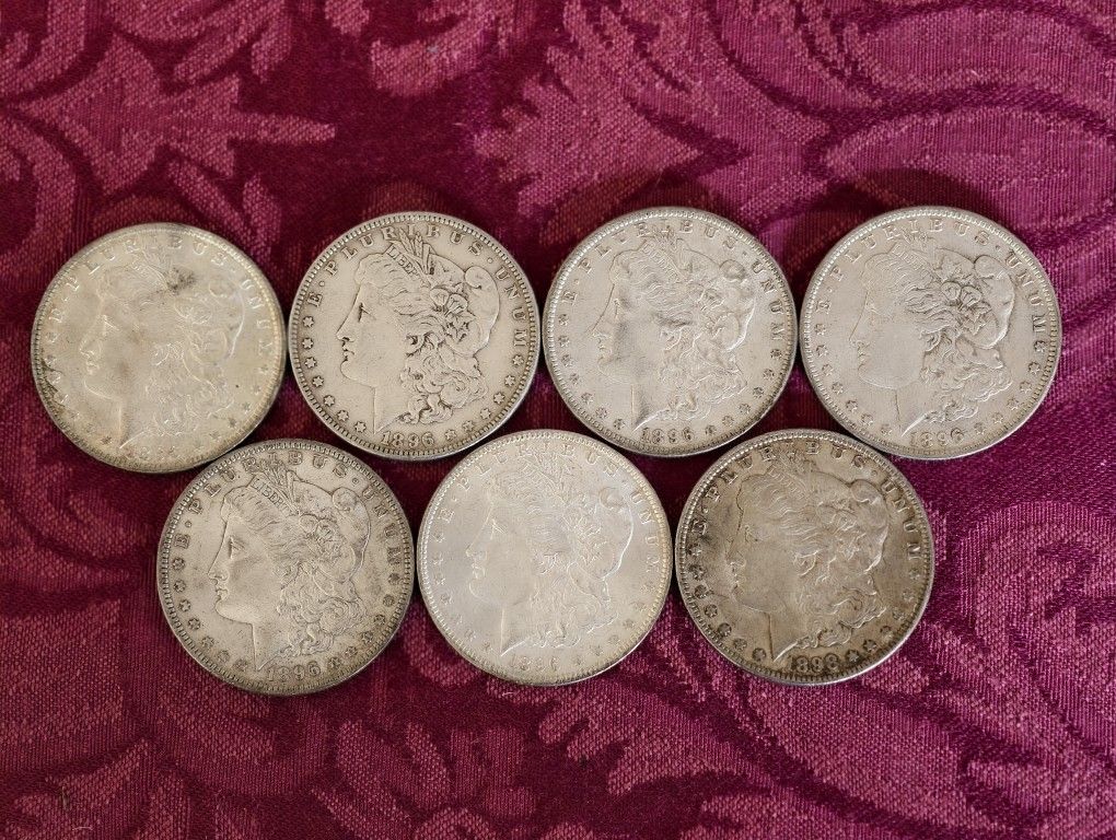 (7) Morgan Silver Dollars. 1896 & 1898