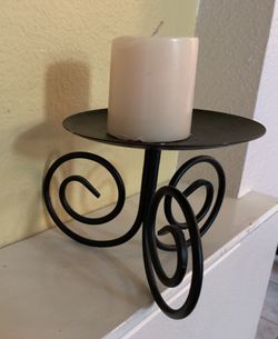 Iron candle holder