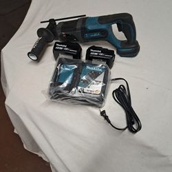 Makita 18 V roto hammer with Two5.0 AH batteries and charger.