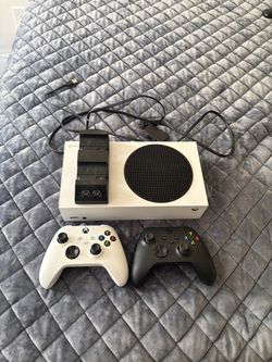 Xbox Series S with controller and charging packs