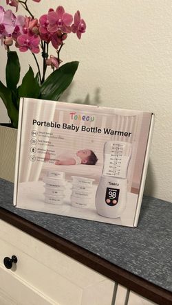 Portable baby bottle warmer