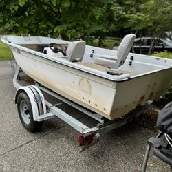 14’ Livingston boat and Trailer