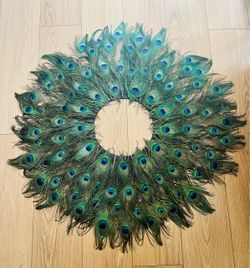 Peacock feather centerpieces or wreaths