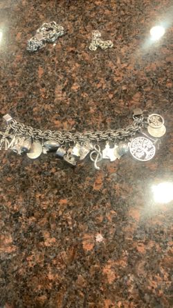 Beautiful Elco sterling bracelet with 21 sterling /925 charms