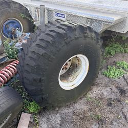 1977 Ford F150 reverse rotation top pinion axle and a Dana 60 rear axle with tires and wheels $1000 or best offer