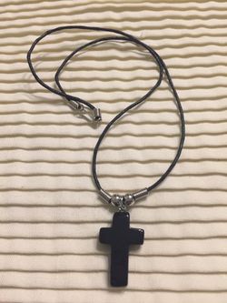Cross Pendant on Black Cord new. (119)