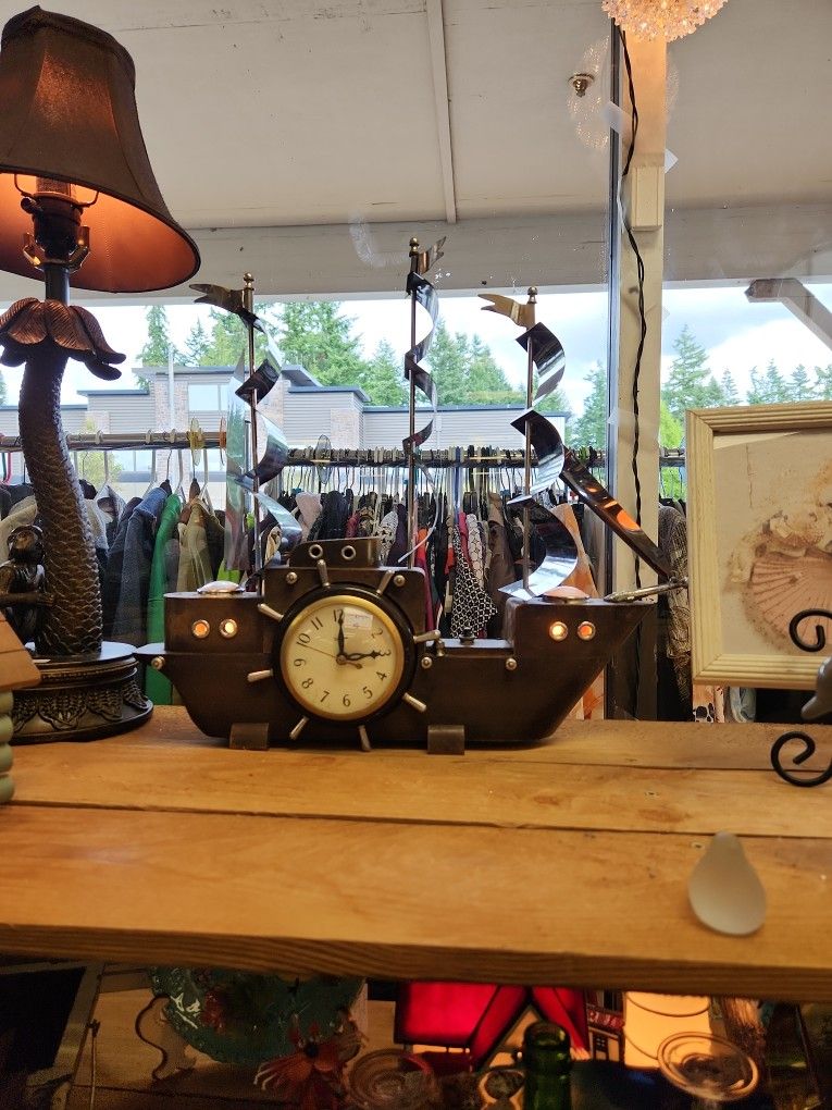 ship clock lamp. clock needs repair-lights work. missing small front-end piece. $75 as is.