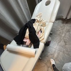 Massage table