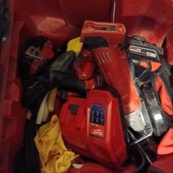 Milwaukee Travel Roller W/1/2inch Drill, 1/4inch Driver,Cutoff Tool,4batteries  One Charger, One Toolbelt In Great Condition,Drill Bt Set,Electricians