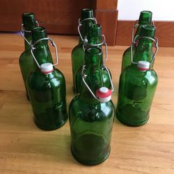 Lot of 7 Large Green Flip Top Beer Soda Beverage Bottles
