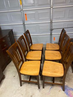 Beautiful set of 6 solid wood dining chairs.