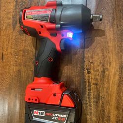 Milwaukee M18  1/2" High Torque Impact Wrench Kit with M18 REDLITHIUM XC5.0 Battery Product Overview: The Ultimate Cordless Powerhouse for Heavy-D