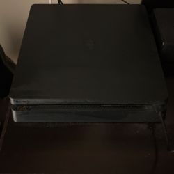 PlayStation 4 (1 Terabyte of Storage) and other items