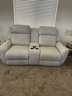 Leather electric love seat with head and lumbar adjustment