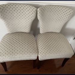 Decorative chairs  never used  Bought from tjmax  moved into small apartment dnt have room  need gone asap 