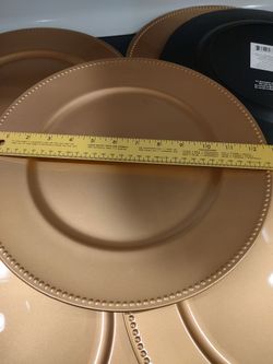 6 gold color charger plates