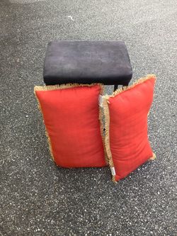 two pillars with bar stool