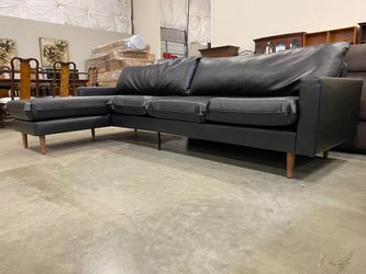 Black Leather L-Shaped Sectional with Wooden Legs
