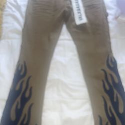 Valabasas Size 32 Stacked Flared Brown Jeans.
