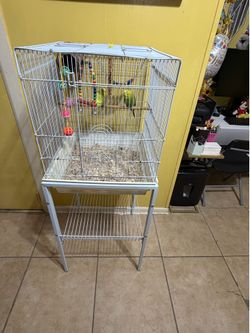 This white bird cage I have the wheels and it’s in good condition