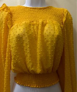 Women's size S yellow smocked crop top with a raised polka-dot print.