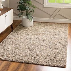 Carpets (4): Solid Shag; Navajo Décor Throw; Pure 5x8 Wool; Wool Maroon Décor Throw