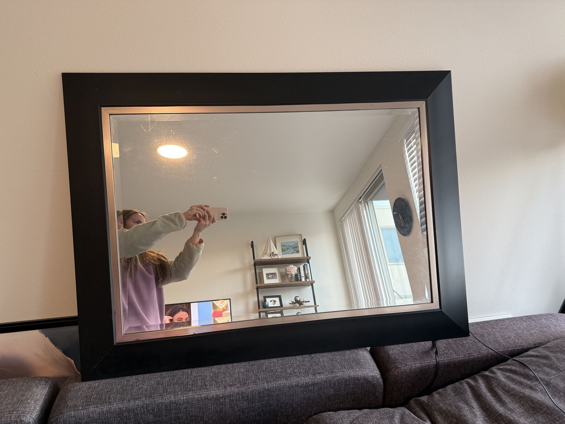 Large black wall mirror