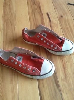 Reddish orange converse