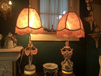 Two antique figural lamps and shades
