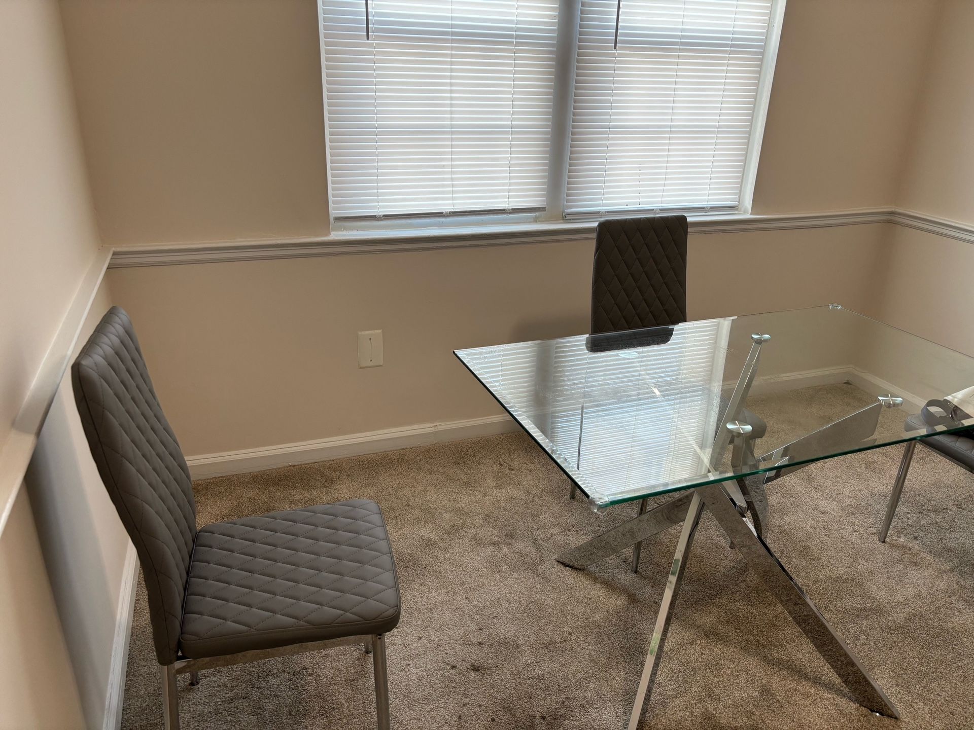 4-person Glass Table With Matching Gray Chairs