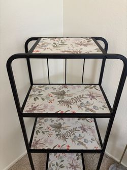 perfect condition black and floral shelf