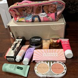 Cosmetics Including Fenty Stunna Lip Paint And Estée Lauder Summer Comic Strip Bag