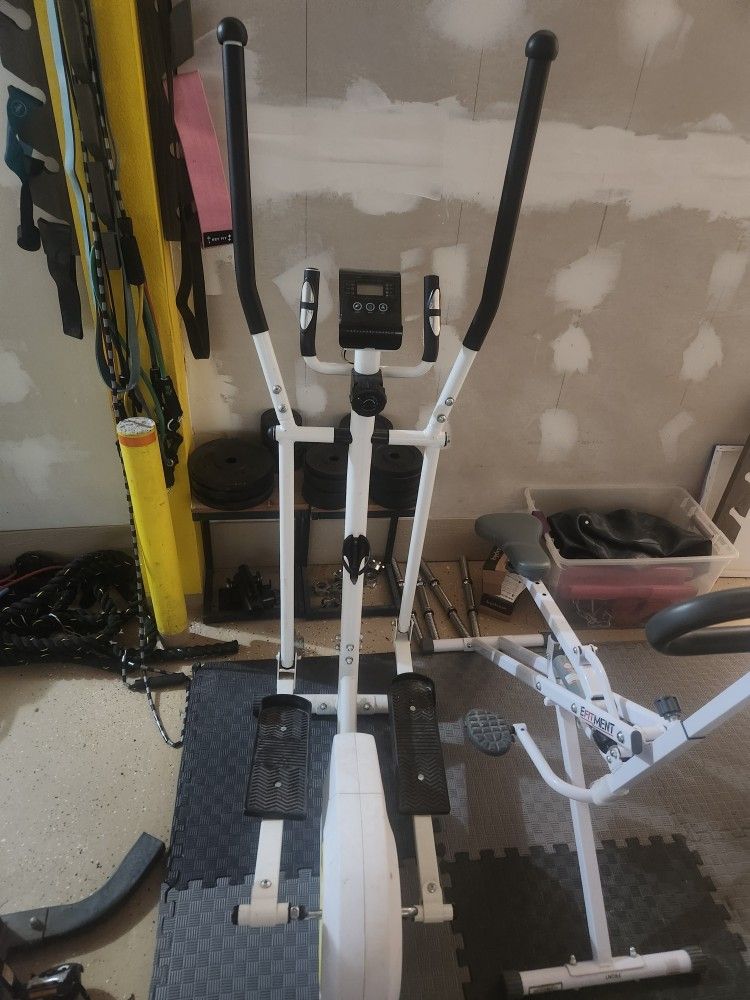 Elliptical, Assisted Squat Machine, 2 Workout Benches And On Bar Rack For Chest Day And Squats.
