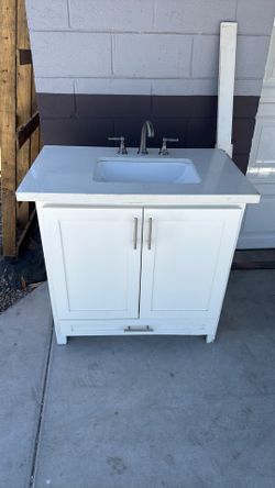 36" white vanity with quartz top, sink and faucet