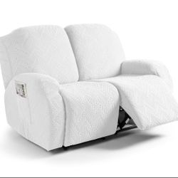 White stretchable fabric slipcover has a textured chevron pattern. Material is designed for a 2-seat reclining loveseat. 