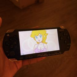 PSP with Games Movies and Charger 