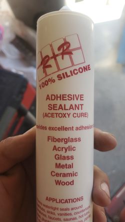 Silicone adhesive