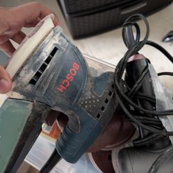 Bosch Palm Sander + Sanding Discs - $40 