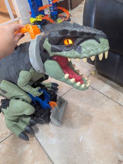 17 in Fisher Price Dinosaur toy - Dinosaurio de Juguete