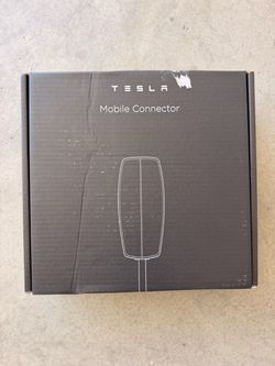 Brand new Tesla charger