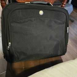 Dell Briefcase laptop bag 13 inch, extra support/Cushion, for Suitcase, a lot of storage, strap,cd's,

Pick up East side El Paso by Lee Trevino 