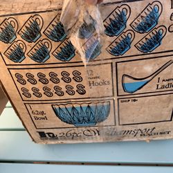 Two different vintage punch bowl sets both glass with cups and a plastic punch ladle