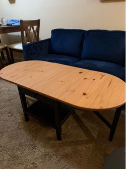 Coffee table with drop leaves